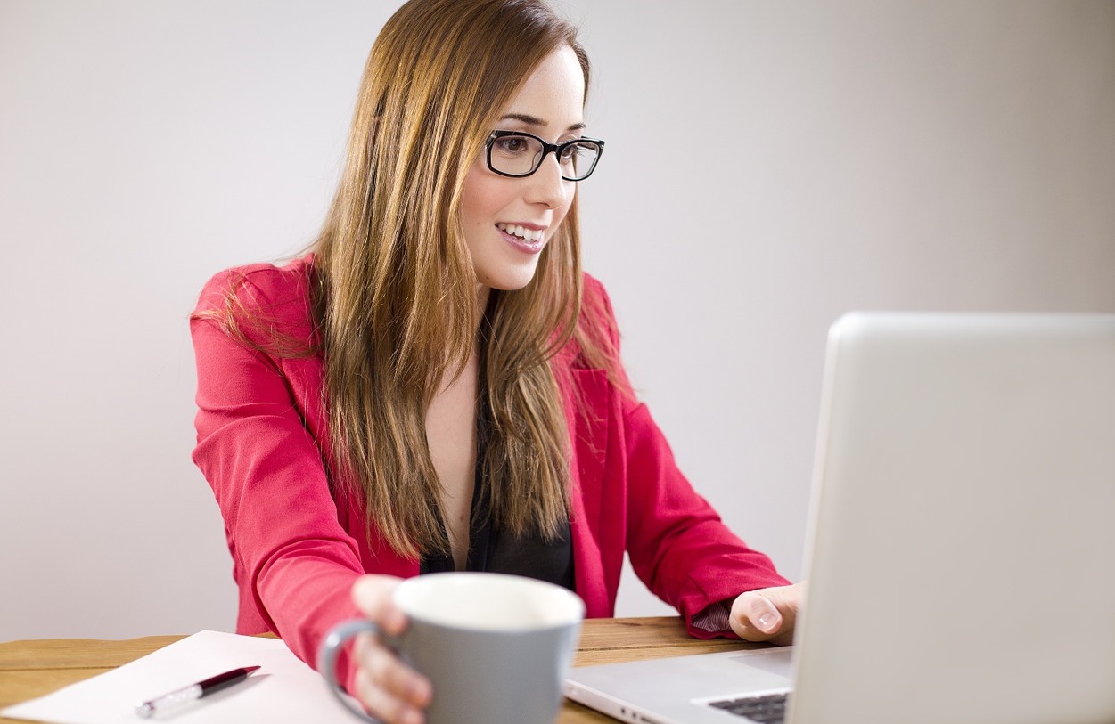 Beautiful woman working from her laptop